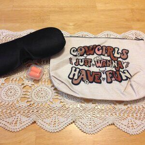 Cowgirl cosmetics bag with bonus eye mask and earplugs